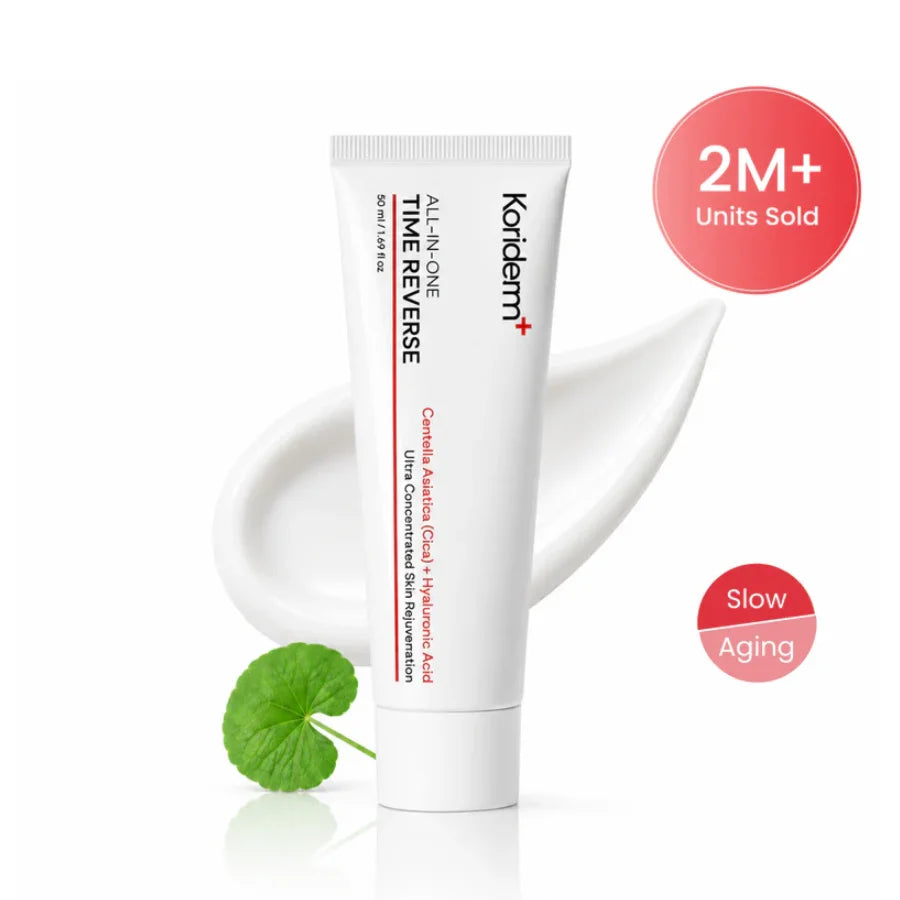 Koriderm Time Reverse Cica Cream tube with cream swatch and Centella asiatica leaf
