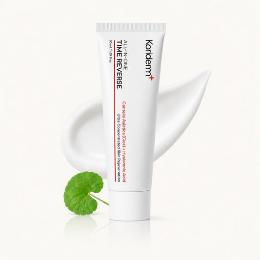 Koriderm Time Reverse Cica Cream tube with cream swatch and Centella asiatica leaf